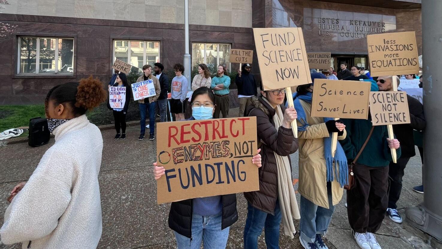 University Researchers Protest Federal Funding Cuts at Downtown Rally